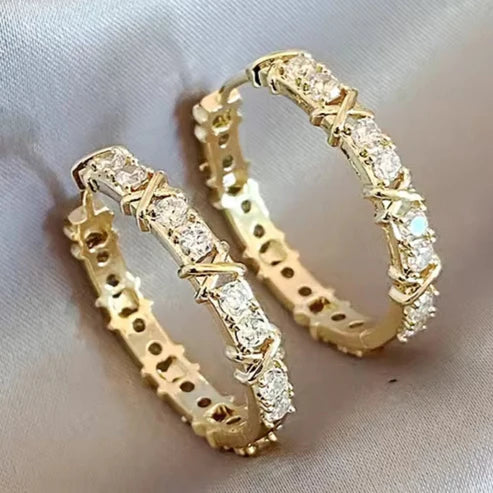 Boucles d'oreilles créoles dorées brillantes