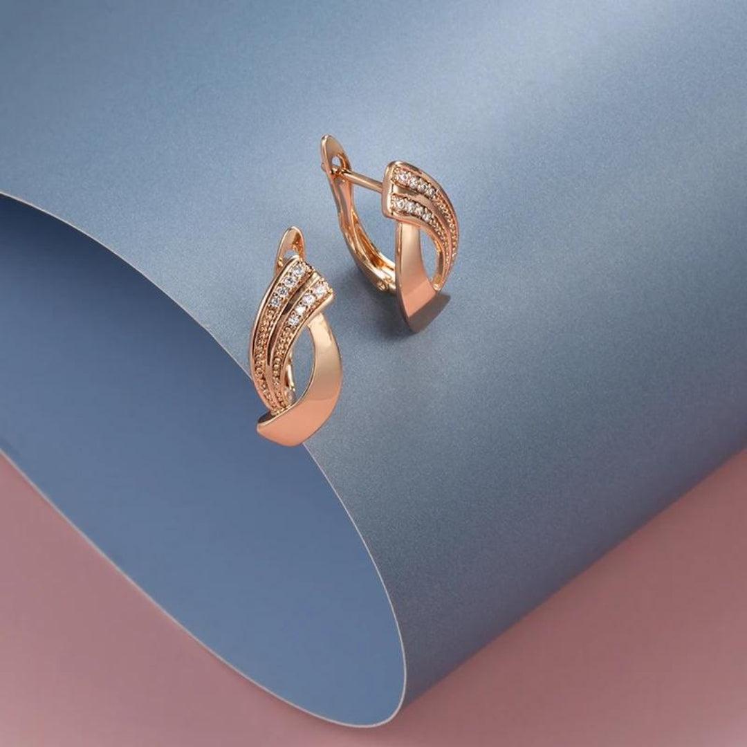 Boucles d'oreilles élégantes avec zirconia en or rose