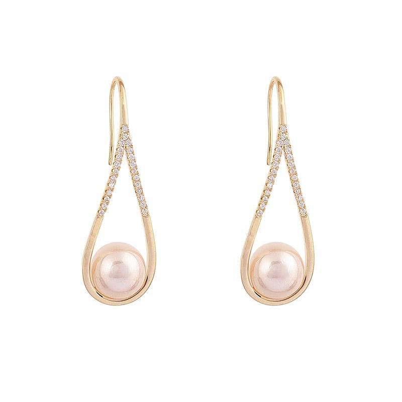 Boucles d'oreilles en perles rose doré