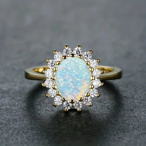 Bague en or avec zirconia opale arrondi