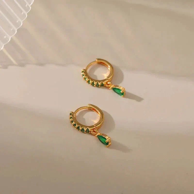 Boucles d'oreilles en zirconium avec émeraude en or