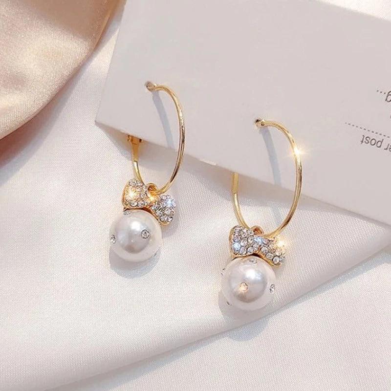 Boucles d'oreilles en or brillant avec perles