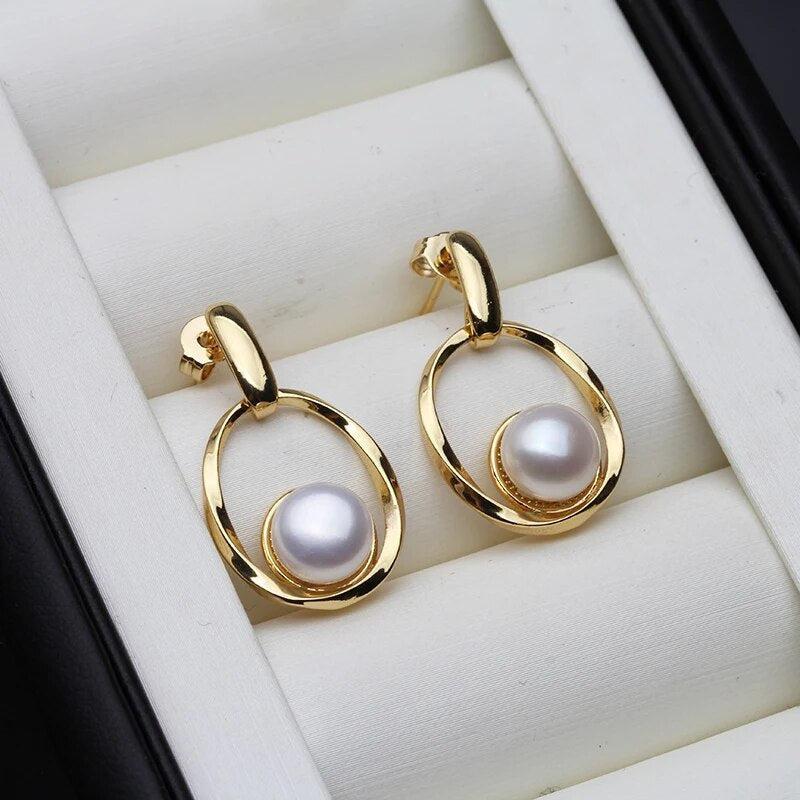 Boucles d'oreilles élégantes en or et perles