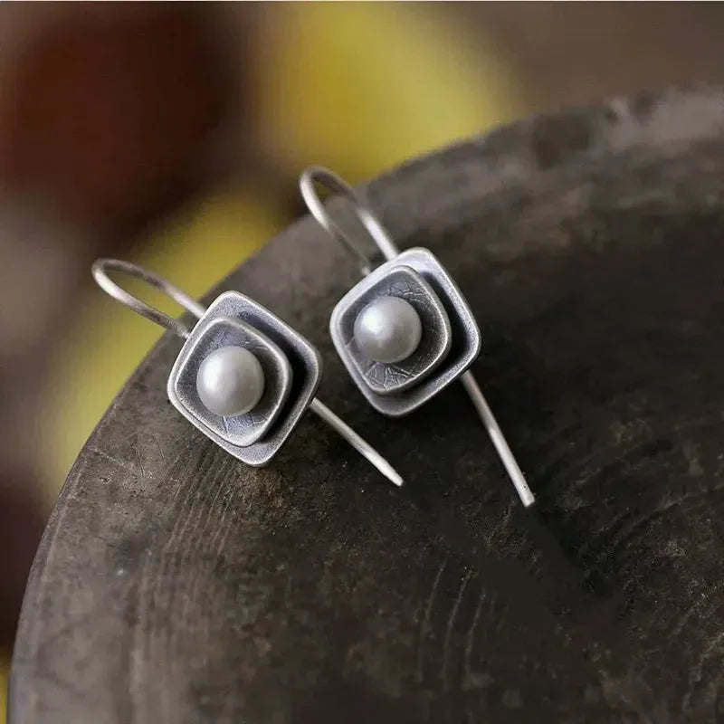 Boucles d'oreilles en perles incrustées d'argent vintage