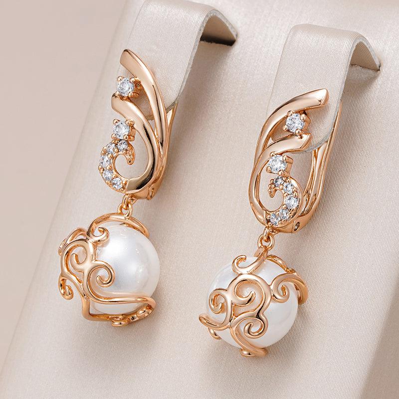Boucles d'oreilles élégantes avec des perles d'eau douce