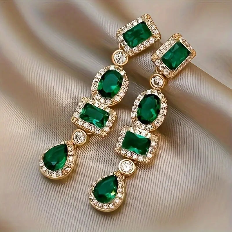 Boucles d'oreilles pendantes en or et émeraude multi-formes