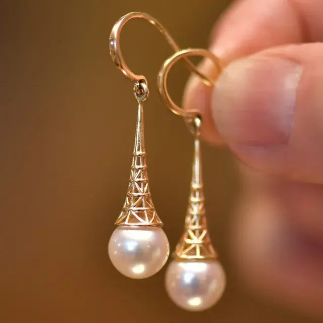 Boucles d'oreilles en perles avec filigrane doré