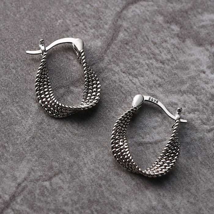 Boucles d'oreilles en argent vintage irrégulières