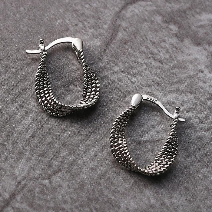 Boucles d'oreilles en argent vintage en maille