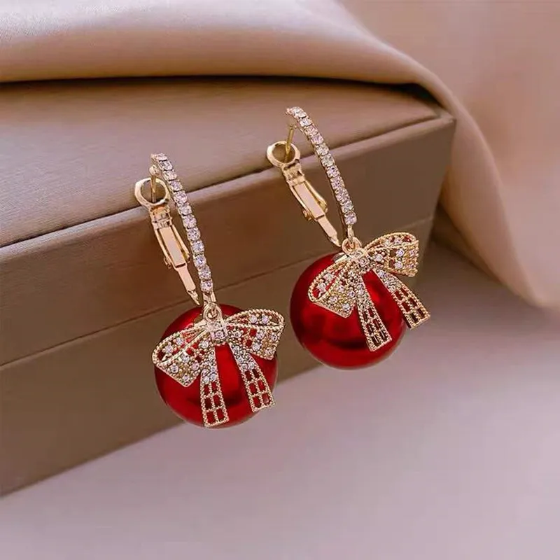 Boucles d'oreilles en perles rouges élégantes