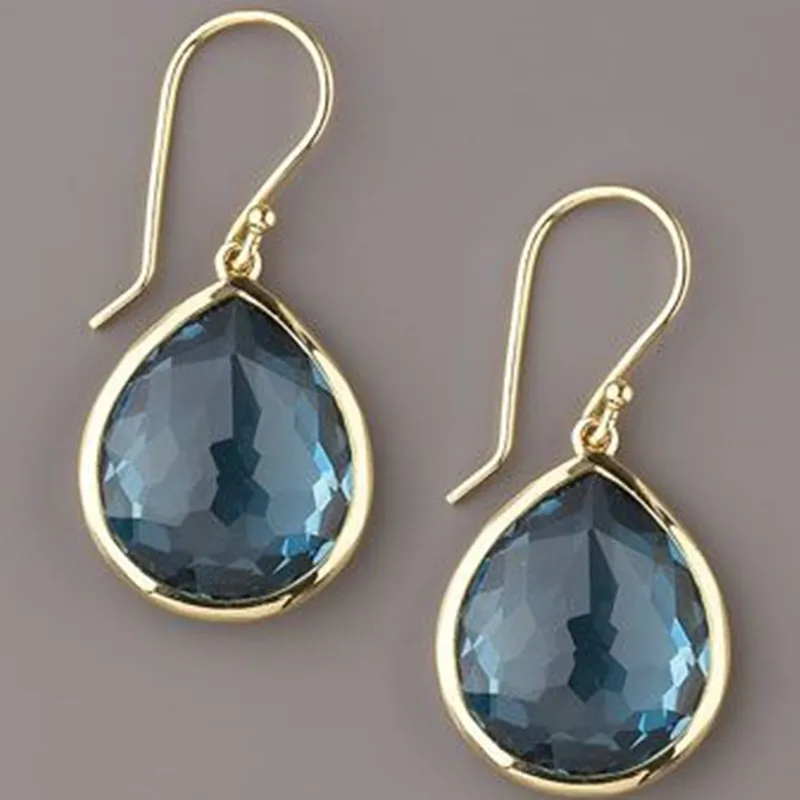 Boucles d'oreilles en cristal bleu en or
