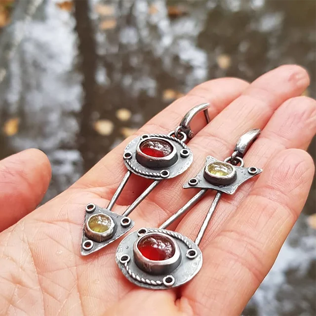 Boucles d'oreilles mécaniques en cristal de feu