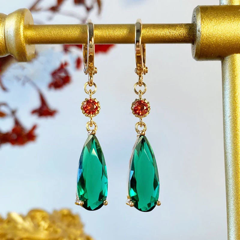 Boucles d'oreilles pendantes en cristal vintage vert