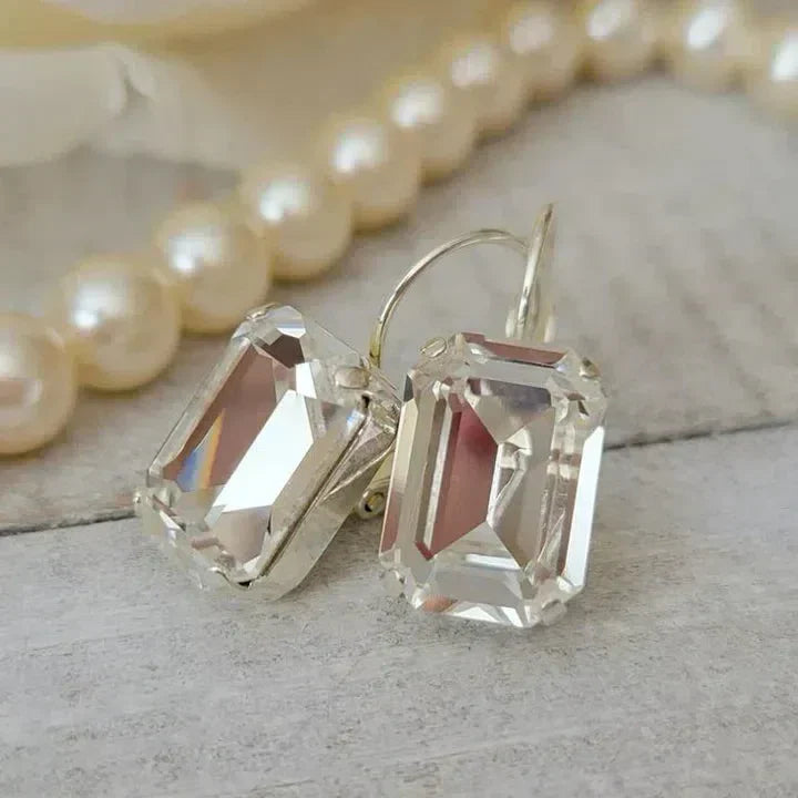Boucles d'oreilles vintage en verre blanc