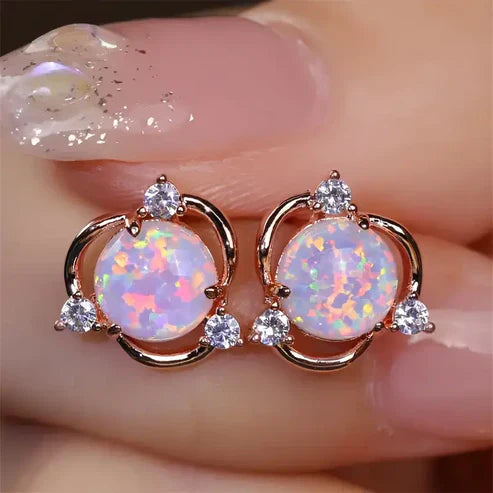Boucles d'oreilles en or avec opale rose