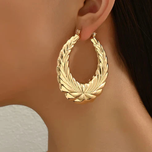 Boucles d'oreilles créoles en tiara dorée