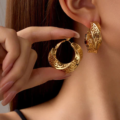 Boucles d'oreilles en or irrégulières