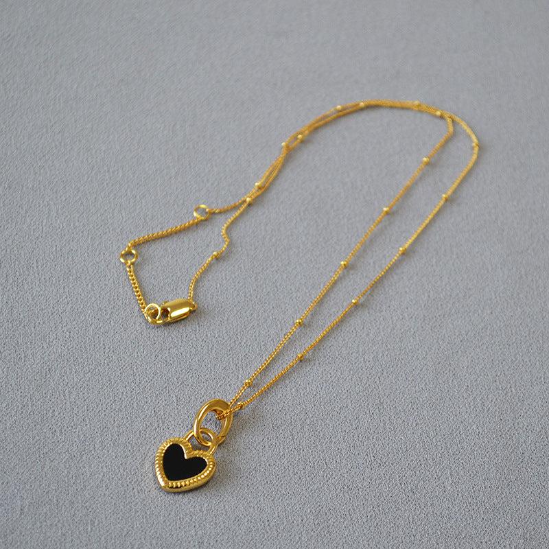 Collier en Cœur Noir et Blanc en Or