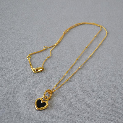 Collier en Cœur Noir et Blanc en Or