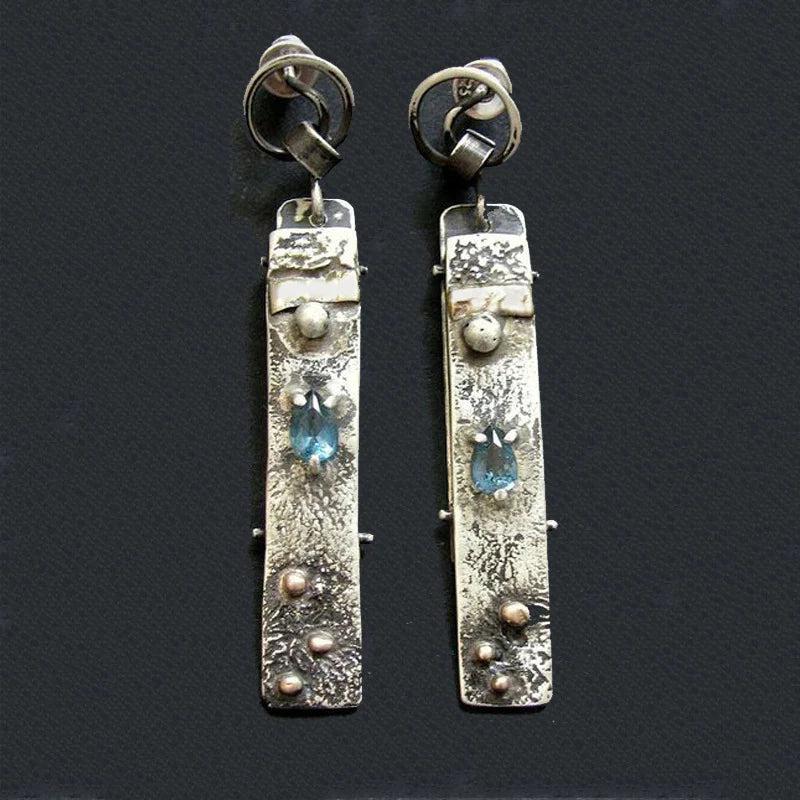 Boucles d'oreilles faites à la main en pierre bleue