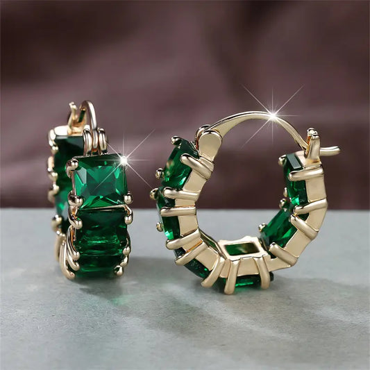 Boucles d'oreilles créoles épaisses en or et émeraude