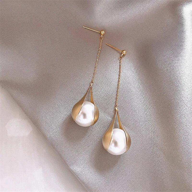 Boucles d'oreilles en perles dorées
