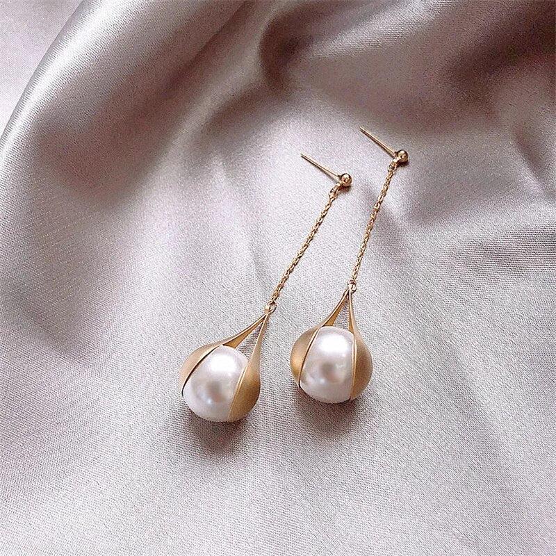 Boucles d'oreilles en perles dorées