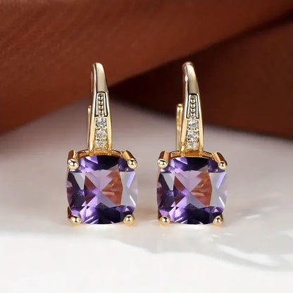 Boucles d'oreilles créoles en or avec pierres précieuses mystiques