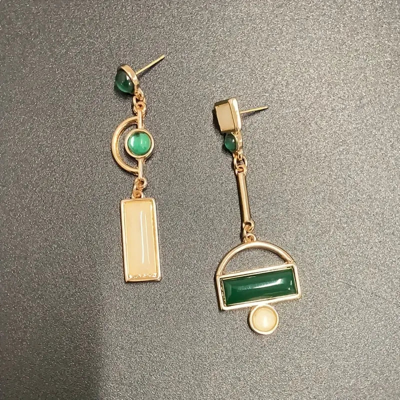 Boucles d'oreilles géométriques pendantes en or émeraude