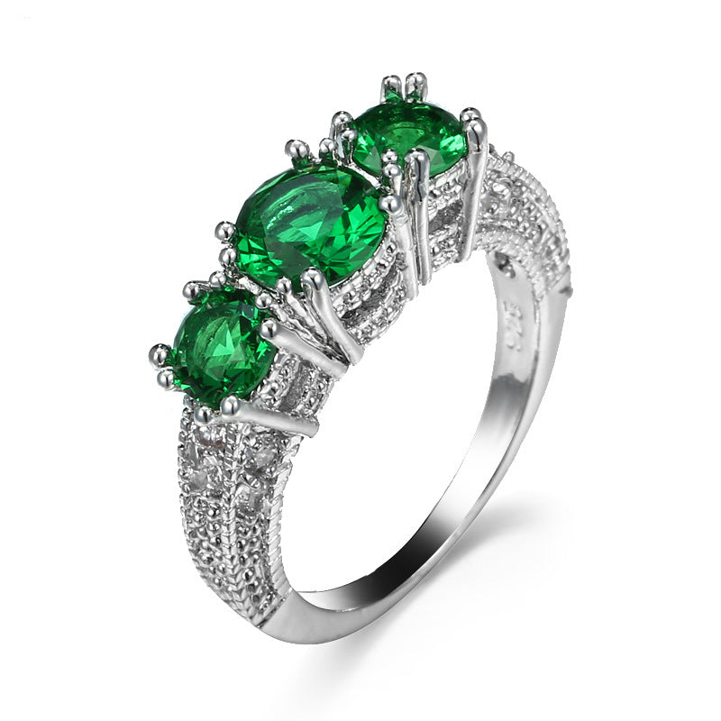 Bague en Argent et Émeraudes à Trois Pierres