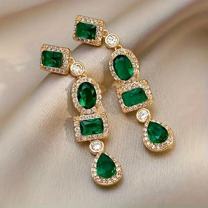 Boucles d'oreilles pendantes en or et émeraude multi-formes