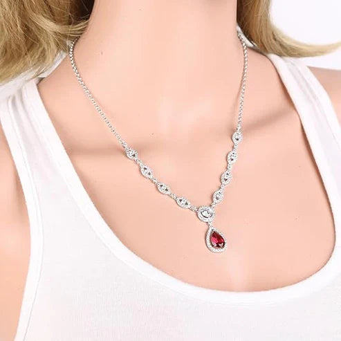 Ensemble collier et boucles d'oreilles Ruby Halo