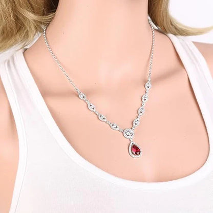 Ensemble collier et boucles d'oreilles Ruby Halo