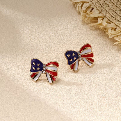 Boucles d'oreilles clous Liberty Bow of Grace