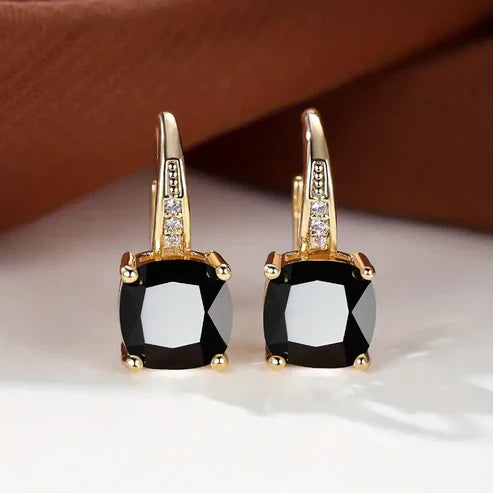 Boucles d'oreilles en forme de cerceau avec pierre mystique