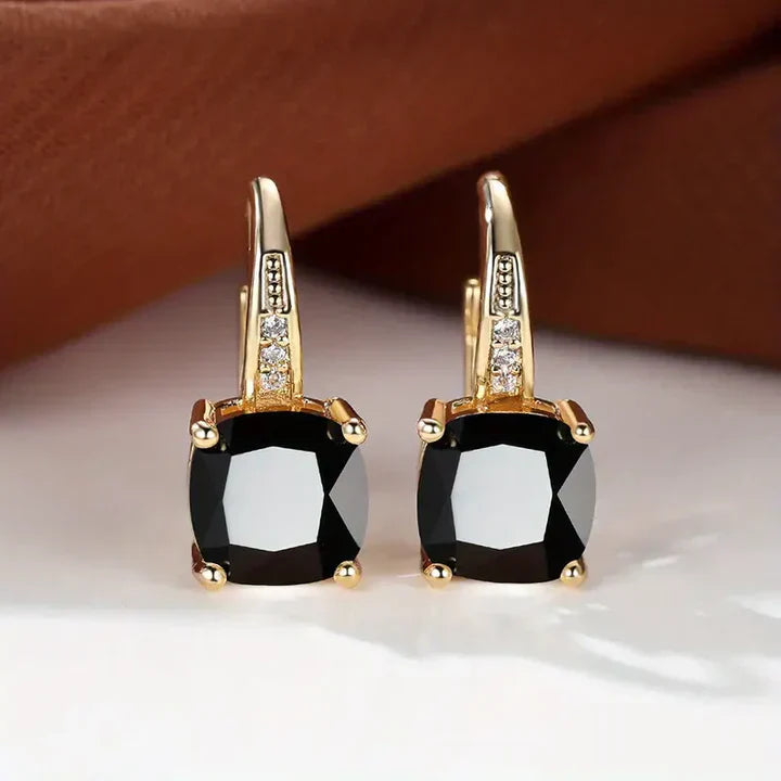 Boucles d'oreilles créoles en or avec pierres précieuses mystiques