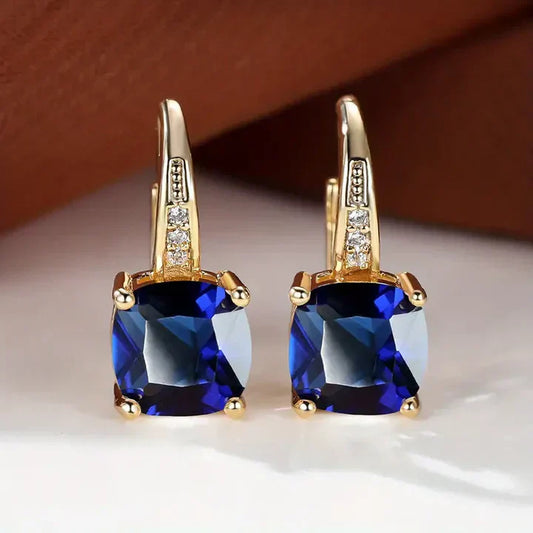 Boucles d'oreilles créoles en or avec pierres précieuses mystiques