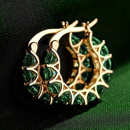 Boucles d'oreilles créoles en or et émeraude