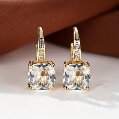 Boucles d'oreilles créoles en or avec pierres précieuses mystiques