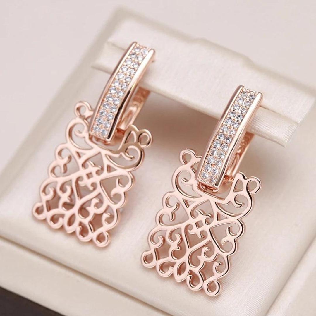 Boucles d'oreilles en or rose avec zirconia