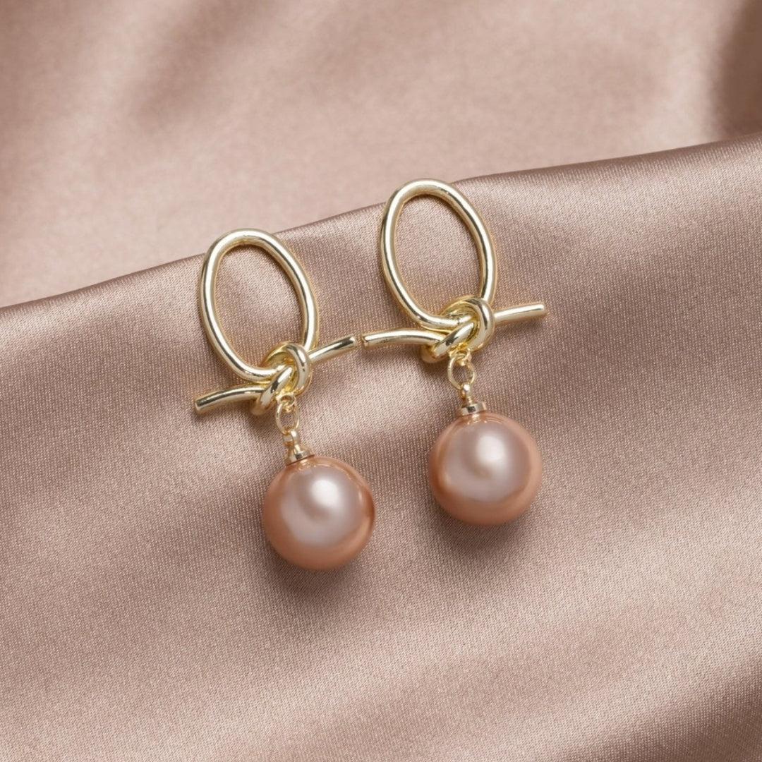 Boucles d'oreilles en boucle de perles dorées
