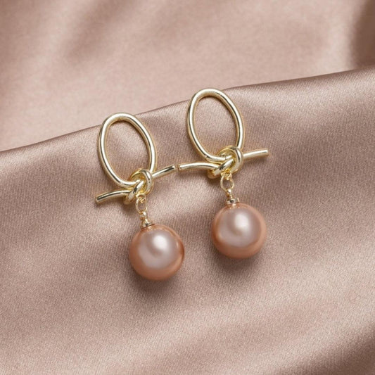 Boucles d'oreilles en boucle de perles dorées