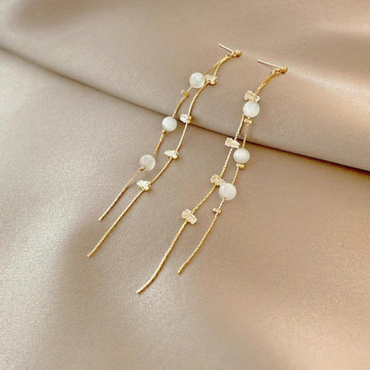Boucles d'oreilles pendantes élégantes avec perles et zircon