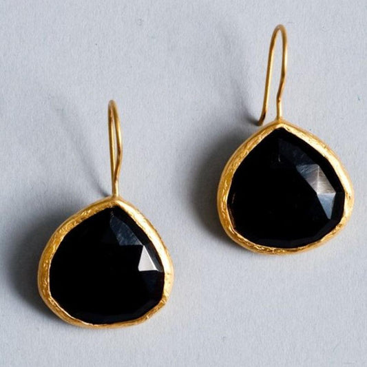 Boucles d'oreilles vintage en pierre noire et or
