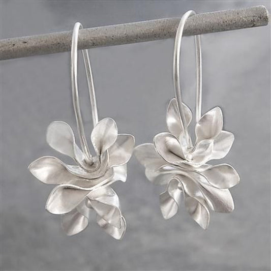 Boucles d'oreilles en argent vintage à fleurs irrégulières