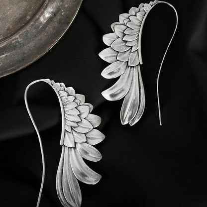 Boucles d'oreilles vintage à ailes en argent