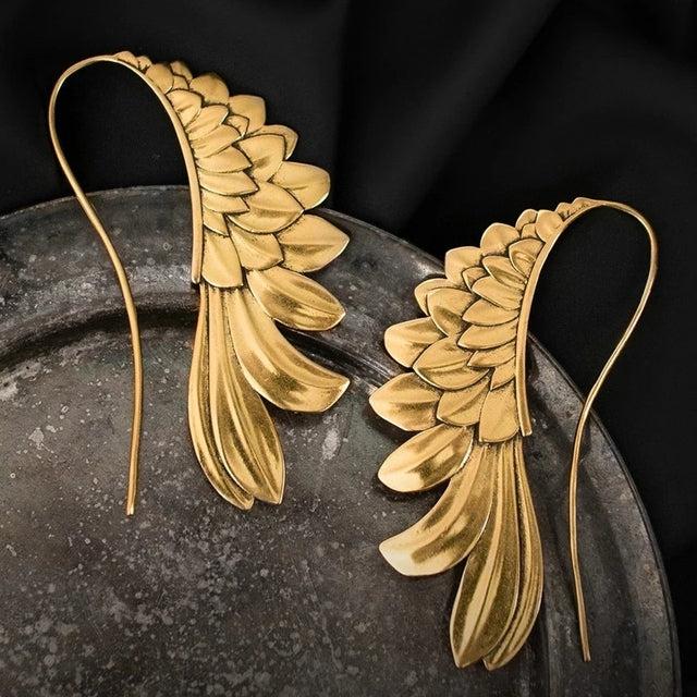Boucles d'oreilles vintage à ailes en argent