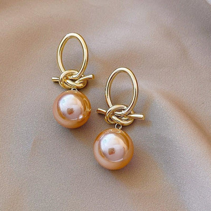 Boucles d'oreilles en boucle de perles dorées
