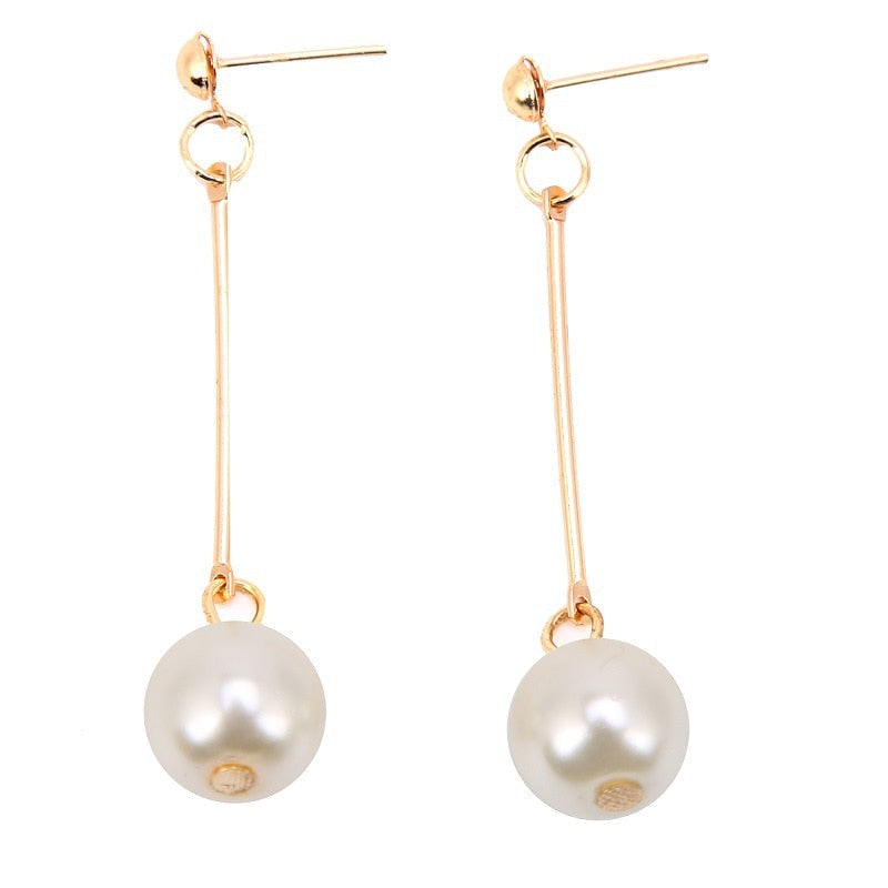 Boucles d'oreilles pendantes en perles dorées