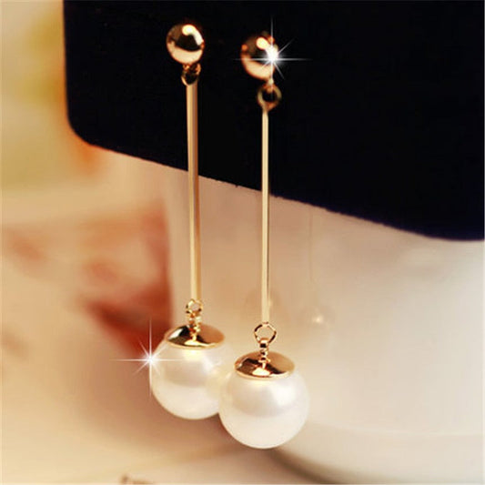Boucles d'oreilles pendantes en perles dorées